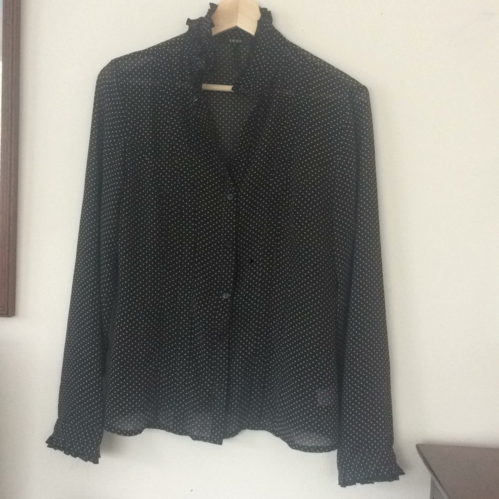 Sheer black button-up blouse with white polka dots
